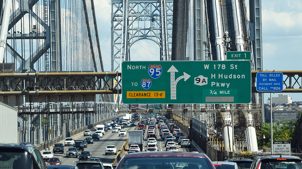 Cars head north on I-95 over the George Washington Bridge.